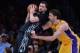 Dec 20, 2013; Los Angeles, CA, USA; Los Angeles Lakers center Pau Gasol (16) guards Minnesota Timberwolves power forward Kevin Love (42) in the second half of the game at Staples Center. The Lakers won 104-91. Mandatory Credit: Jayne Kamin-Oncea-USA TODAY