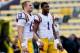 Sep 21, 2013; Baton Rouge, LA, USA; LSU Tigers quarterback Jake Clise (13) and quarterback Rob Bolden (1) before a game against the Auburn Tigers at Tiger Stadium. Mandatory Credit: Derick E. Hingle-USA TODAY Sports