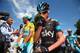 LONDON, ENGLAND - JULY 07: Chris Froome (c) of Great Britain and Team SKY looks on at the start of the third stage of the 2014 Tour de France, a 155km stage between Cambridge and London, on July 7, 2014 in Cambridge, England. (Photo by Bryn Lennon/Getty
