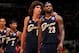 LOS ANGELES - DECEMBER 25: Anderson Varejao #17 (L) of the Cleveland Cavaliers talks with teammate LeBron James #23 (R) during the game against the Los Angeles Lakers on December 25, 2009 at Staples Center in Los Angeles, California. The Cavaliers won 1