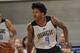ORLANDO, FL - JULY 7: Elfrid Payton #4 of the Orlando Magic defends against the Houston Rockets on July 7, 2014 at Amway Center in Orlando, Florida. NOTE TO USER: User expressly acknowledges and agrees that, by downloading and or using this photograph, Us