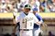 OAKLAND, CA - JULY 06: Craig Gentry #3 of the Oakland Athletics reacts after scoring on a double by Derek Norris #36 in the eighth inning of their game against the Toronto Blue Jays at O.co Coliseum on July 6, 2014 in Oakland, California. (Photo by Ezra