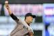 MINNEAPOLIS, MN - JULY 3: Masahiro Tanaka #19 of the New York Yankees delivers a pitch against the Minnesota Twins during the fifth inning of the game on July 3, 2014 at Target Field in Minneapolis, Minnesota. The Yankees defeated the Twins 7-4. (Photo by