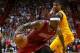 MIAMI, FL - DECEMBER 14: LeBron James #6 of the Miami Heat drives on Kyrie Irving #2 of the Cleveland Cavaliers during a game at American Airlines Arena on December 14, 2013 in Miami, Florida. NOTE TO USER: User expressly acknowledges and agrees that, b