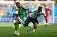 BRASILIA, BRAZIL - JUNE 30: John Obi Mikel of Nigeria challenges Paul Pogba of France during the 2014 FIFA World Cup Brazil Round of 16 match between France and Nigeria at Estadio Nacional on June 30, 2014 in Brasilia, Brazil. (Photo by Jeff Gross/Getty