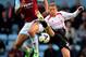 LONDON, ENGLAND - APRIL 06: Winston Reid of West Ham and Lucas Leiva of Liverpool compete for the ball during the Barclays Premier League match between West Ham United and Liverpool at Boleyn Ground on April 6, 2014 in London, England. (Photo by Mike He
