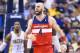 INDIANAPOLIS, IN - MAY 13: Marcin Gortat #4 of the Washington Wizards celebrates against the Indiana Pacers in Game 5 of the Eastern Conference Semifinals during the 2014 NBA Playoffs at Bankers Life Fieldhouse on May 13, 2014 in Indianapolis, Indiana.