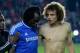 PRAGUE, CZECH REPUBLIC - AUGUST 30: Michael Essien (L) and David Luiz (R) console Romelu Lukaku of Chelsea after defeat in the UEFA Super Cup between Bayern Muenchen and Chelsea at Stadion Eden on August 30, 2013 in Prague, Czech Republic. (Photo by Sh