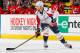 NEWARK, NJ - APRIL 04: Mike Green #52 of the Washington Capitals plays the puck against the New Jersey Devils during the game at the Prudential Center on April 4, 2014 in Newark, New Jersey. (Photo by Andy Marlin/NHLI via Getty Images)