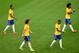 Not sure if walking back to centre circle...or Brazil's marking during the game.