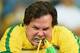 BELO HORIZONTE, BRAZIL - JULY 08: An emotional Brazil fan reacts after being defeated by Germany 7-1 during the 2014 FIFA World Cup Brazil Semi Final match between Brazil and Germany at Estadio Mineirao on July 8, 2014 in Belo Horizonte, Brazil. (Photo b