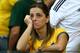 BELO HORIZONTE, BRAZIL - JULY 08: A dejected Brazil fan looks on during the 2014 FIFA World Cup Brazil Semi Final match between Brazil and Germany at Estadio Mineirao on July 8, 2014 in Belo Horizonte, Brazil. (Photo by Robert Cianflone/Getty Images)