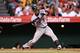 ANAHEIM, CA - JUNE 24: Brian Dozier #2 of the Minnesota Twins hits an RBI single to tie the score at 5-5 in the second inning against the Los Angeles Angels of Anaheim at Angel Stadium of Anaheim on June 24, 2014 in Anaheim, California. (Photo by Stephe