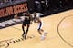 SAN ANTONIO, TX - JUNE 15: LeBron James #6 of the Miami Heat drives to the basket against the San Antonio Spurs during Game Five of the 2014 NBA Finals between the Miami Heat and San Antonio Spurs at AT&T Center on June 15, 2014 in San Antonio, Texas. NOT