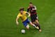 BELO HORIZONTE, BRAZIL - JULY 08: David Luiz of Brazil is challenged by Miroslav Klose of Germany during the 2014 FIFA World Cup Brazil Semi Final match between Brazil and Germany at Estadio Mineirao on July 8, 2014 in Belo Horizonte, Brazil. (Photo by