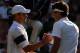 WIMBLEDON, ENGLAND - JULY 05: Roger Federer of Switzerland shakes hands with Andy Roddick of USA after the men's singles final match on Day Thirteen of the Wimbledon Lawn Tennis Championships at the All England Lawn Tennis and Croquet Club on July 5, 200