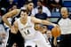 Jan 13, 2014; New Orleans, LA, USA; New Orleans Pelicans center Jason Smith (14) is guarded by San Antonio Spurs power forward Tim Duncan (21) during the first quarter of a game at the New Orleans Arena. Mandatory Credit: Derick E. Hingle-USA TODAY Sports