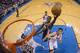 OKLAHOMA CITY, OK - MARCH 30: Marvin Williams #2 of the Utah Jazz drives to the basket against the Oklahoma City Thunder- at the Chesapeake Arena on March 30, 2014 in Oklahoma City, Oklahoma. NOTE TO USER: User expressly acknowledges and agrees that, by