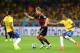 BELO HORIZONTE, BRAZIL - JULY 08: Toni Kroos of Germany controls the ball as Luiz Gustavo of Brazil give chase during the 2014 FIFA World Cup Brazil Semi Final match between Brazil and Germany at Estadio Mineirao on July 8, 2014 in Belo Horizonte, Brazil