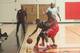 Head coach David Baskin coaching strong defense
