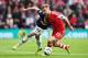 SOUTHAMPTON, ENGLAND - MAY 11: (L-R) Adnan Januzaj of Manchester United and Luke Shaw of Southampton challenge for the ball during the Barclays Premier League match between Southampton and Manchester United at St Mary's Stadium on May 11, 2014 in Southam