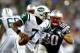 FOXBORO, MA - SEPTEMBER 12: Quarterback Geno Smith #7 of the New York Jets looks to avoid the rush by defensive end Rob Ninkovich #50 of the New England Patriots in the first half at Gillette Stadium on September 12, 2013 in Foxboro, Massachusetts. (Pho