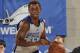 ORLANDO, FL - JULY 8: Casper Ware #12 of the Philadelphia 76ers handles the ball against the Houston Rockets on July 8, 2014 at Amway Center in Orlando, Florida. NOTE TO USER: User expressly acknowledges and agrees that, by downloading and or using this p