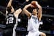 May 2, 2014; Dallas, TX, USA; Dallas Mavericks forward Dirk Nowitzki (41) shoots over San Antonio Spurs center Tiago Splitter (22) during the game in game six of the first round of the 2014 NBA Playoffs at American Airlines Center. Mandatory Credit: Kevin