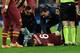 NAPLES, ITALY - MARCH 09: Kevin Strootman of Roma lies injured during the Serie A match between SSC Napoli and AS Roma at Stadio San Paolo on March 9, 2014 in Naples, Italy. (Photo by Giuseppe Bellini/Getty Images)