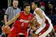 MEMPHIS, TN - MARCH 27: Devin Oliver #5 of the Dayton Flyers drives to the basket as Josh Huestis #24 of the Stanford Cardinal defends during a regional semifinal of the 2014 NCAA Men's Basketball Tournament at the FedExForum on March 27, 2014 in Memphis,