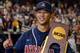 OMAHA, NE - JUNE 25: Robert Refsnyder #2 of the Arizona Wildcats poses with the trophy after a 4-1 win and a 2-0 series sweep over the South Carolina Gamecocks after game 2 of the College World Series at TD Ameritrade Field on June 25, 2012 in Omaha, Neb