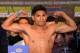 LOS ANGELES, CA - AUGUST 23: Abner Mares poses as he stands onthe scale before his fight against Jhonny Gonzalez during the weigh in at the Millennium Biltmore Hotel on August 23, 2013 in Los Angeles, California. (Photo by Harry How/Getty Images)