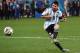 SAO PAULO, BRAZIL - JULY 09: Lionel Messi of Argentina shoots and scores his penalty kick in a shootout during the 2014 FIFA World Cup Brazil Semi Final match between the Netherlands and Argentina at Arena de Sao Paulo on July 9, 2014 in Sao Paulo, Brazil