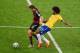 BELO HORIZONTE, BRAZIL - JULY 08:Thomas Mueller of Germany is challenged by Dante of Brazil during the 2014 FIFA World Cup Brazil Semi Final match between Brazil and Germany at Estadio Mineirao on July 8, 2014 in Belo Horizonte, Brazil. (Photo by Jamie M