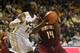 Nov 16, 2013; Richmond, VA, USA; Winthrop Eagles forward James Bourne (14) drives to the basket against Virginia Commonwealth Rams forward Mo Alie-Cox (12) during the second half at Stuart C. Siegel Center. Mandatory Credit: Peter Casey-USA TODAY Sports