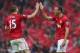 MANCHESTER, ENGLAND - MAY 12: Rio Ferdinand of Manchester United celebrates scoring the winning goal with team-mate Nemanja Vidic during the Barclays Premier League match between Manchester United and Swansea City at Old Trafford on May 12, 2013 in Manch
