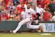 CINCINNATI, OH - JULY 9: Billy Hamilton #6 of the Cincinnati Reds rounds third base for a triple in the fifth inning against the Chicago Cubs and drive in a run at Great American Ball Park on July 9, 2014 in Cincinnati, Ohio. Cincinnati defeated Chicago 4