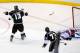 LOS ANGELES, CA - JUNE 13: Alec Martinez #27 of the Los Angeles Kings celebrates with Kyle Clifford #13 after Martinez scores the game-winning goal in double overtime against goaltender Henrik Lundqvist #30 of the New York Rangers to give the Kings the 3