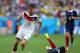 RIO DE JANEIRO, BRAZIL - JULY 04: Thomas Mueller of Germany controls the ball as Patrice Evra of France lies on the pitch during the 2014 FIFA World Cup Brazil Quarter Final match between France and Germany at Maracana on July 4, 2014 in Rio de Janeiro,
