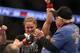 ANAHEIM, CA - FEBRUARY 23: Ronda Rousey celebrates her UFC Bantamweight Title over Liz Carmouche with a member of her team during UFC 157 at Honda Center on February 23, 2013 in Anaheim, California. (Photo by Jeff Gross/Getty Images)