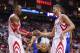 Mar 27, 2014; Houston, TX, USA; Houston Rockets center Dwight Howard (12) and forward Chandler Parsons (25) celebrate after a play during the second quarter against the Philadelphia 76ers at Toyota Center. Mandatory Credit: Troy Taormina-USA TODAY Sports