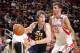 HOUSTON, TX - DECEMBER 1: Gordon Hayward #20 of the Utah Jazz drives the ball against Chandler Parsons #25 of the Houston Rockets on December 1, 2012 at the Toyota Center in Houston, Texas. NOTE TO USER: User expressly acknowledges and agrees that, by dow