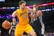 March 19, 2014; Los Angeles, CA, USA; Los Angeles Lakers center Pau Gasol (16) moves to the basket against the San Antonio Spurs during the first half at Staples Center. Mandatory Credit: Gary A. Vasquez-USA TODAY Sports