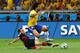 BELO HORIZONTE, BRAZIL - JULY 08: Philipp Lahm of Germany tackles Marcelo of Brazil during the 2014 FIFA World Cup Brazil Semi Final match between Brazil and Germany at Estadio Mineirao on July 8, 2014 in Belo Horizonte, Brazil. (Photo by Martin Rose/Ge