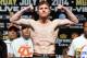 LAS VEGAS, NV - JULY 11: Boxer Canelo Alvarez poses on the scale during his official weigh-in at the MGM Grand Garden Arena on July 11, 2014 in Las Vegas, Nevada. Alvarez will meet Erislandy Lara in a non-title bout on July 12. (Photo by Ethan Miller/Ge