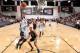 LAS VEGAS, NV - JULY 11: Marcus Denmon #24 of the San Antonio Spurs shoots against the Sacramento Kings on July 11, 2014 at Cox Pavilion in Las Vegas, Nevada. NOTE TO USER: User expressly acknowledges and agrees that, by downloading and or using this phot