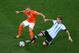 SAO PAULO, BRAZIL - JULY 09: Lucas Biglia of Argentina tackles Wesley Sneijder of the Netherlands during the 2014 FIFA World Cup Brazil Semi Final match between the Netherlands and Argentina at Arena de Sao Paulo on July 9, 2014 in Sao Paulo, Brazil. (P