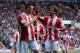 WEST BROMWICH, ENGLAND - MAY 11: Marko Arnautovic (L) and Marc Muniesa of Stoke City celebrate an own goal by Gareth McAuley of West Bromwich Albion (not pictured) during the Barclays Premier League match between West Bromwich Albion and Stoke City at T