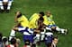 12 Jul 1998: (L to R) Edmundo, Rivaldo, Cafu and Roberto Carlos of Brazil hang their heads in despair after losing the World Cup Final against France at the Stade de France in St Denis. France won 3-0. \ Mandatory Credit: Ross Kinnaird /Allsport