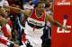 WASHINGTON, DC - APRIL 27: Trevor Ariza #1 of the Washington Wizards celebrates after scoring a key basket late in the fourth quarter against the Chicago Bulls in Game Four of the Eastern Conference Quarterfinals during the 2014 NBA Playoffs at the Veriz
